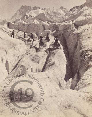 Climbers crossing a glacier