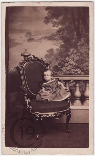 Small child on chair