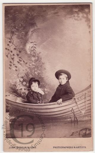 Two children in a rowing boat