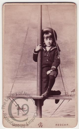 Boy on ship's mast