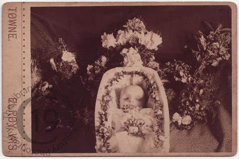 Dehydrated baby in coffin