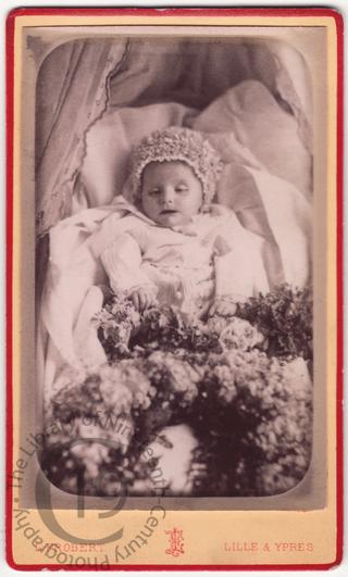 A baby with flowers