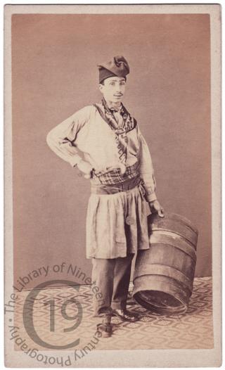 A workman with a barrel