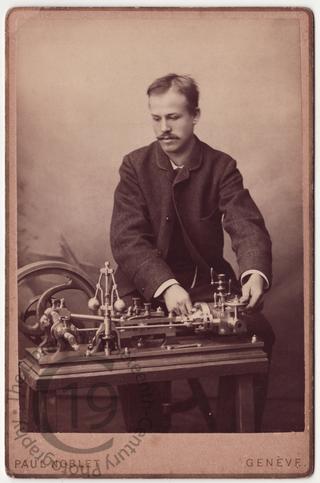 Young man with scientific instrument