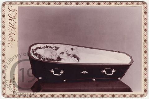 A baby in a coffin