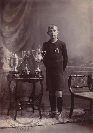 An athlete with his trophy