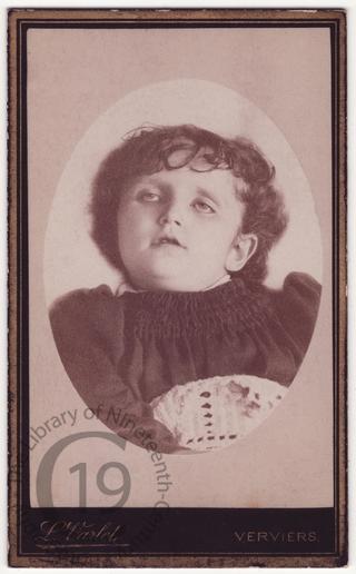 A small child with open eyes