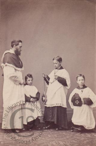 Priest and altar boys