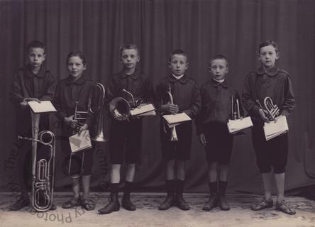 Danish schoolboys with brass instruments