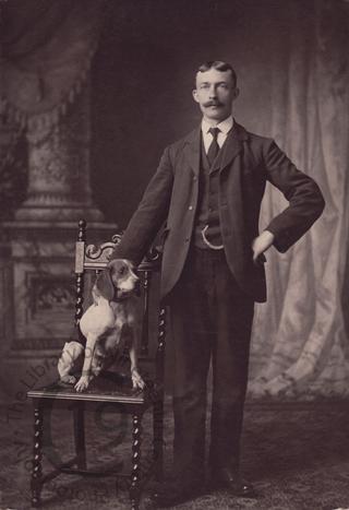 Unidentified man and his dog