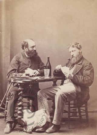 Unidentified men playing cards