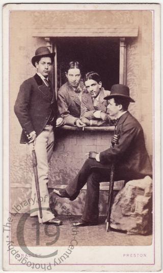 Four men with cigarettes
