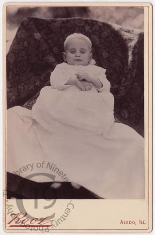 Child with slightly open eyes