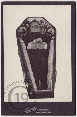 Boy in coffin