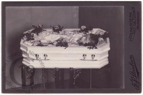 Child in white coffin