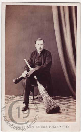 Young man with besom