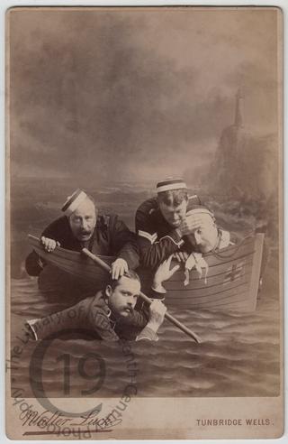 Four men in a boat