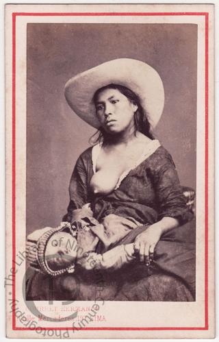 Peruvian woman breastfeeding her baby