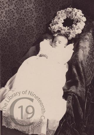 Baby with wreath