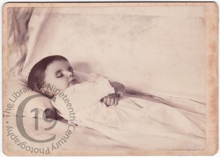 Boy with folded arms