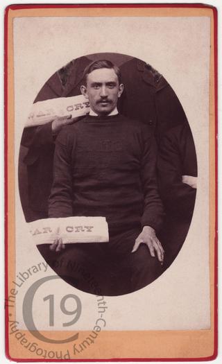 Salvationist with copy of 'The War Cry'